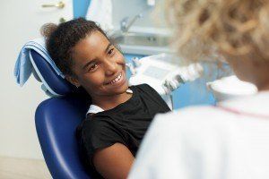 African-Teenager-Visit-Dentist-Office-000021869274_XXXLarge